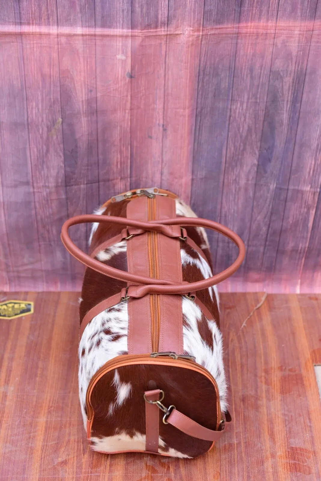 Brown White Cowhide Weekender Travel Bag